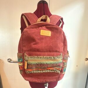 Red Backpack with Patterned Accents